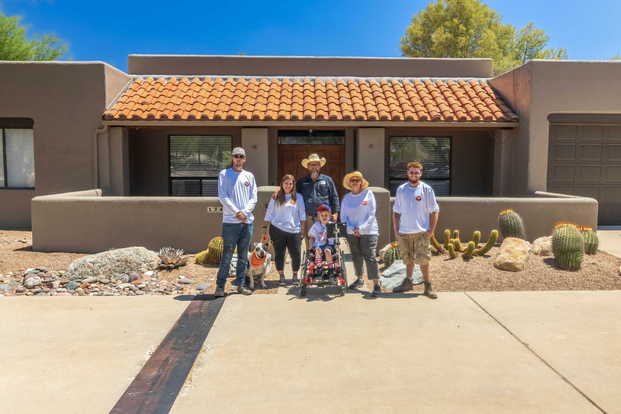 piper-family-painting-company-family-photo-home - Piper Family Painting Company outside of their home