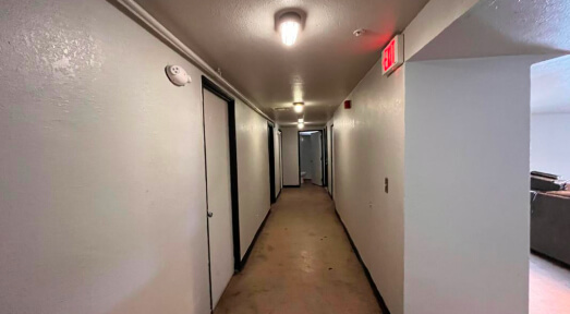 Freshly painted hallway by Piper Family Painting Company, showcasing expert craftsmanship by Rancho Vistoso Painting Company with clean lines and soft tones.